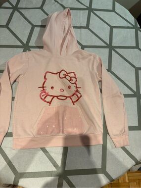 3/15$ Hello Kitty Light Pink Hoodie with Sequin Pocket